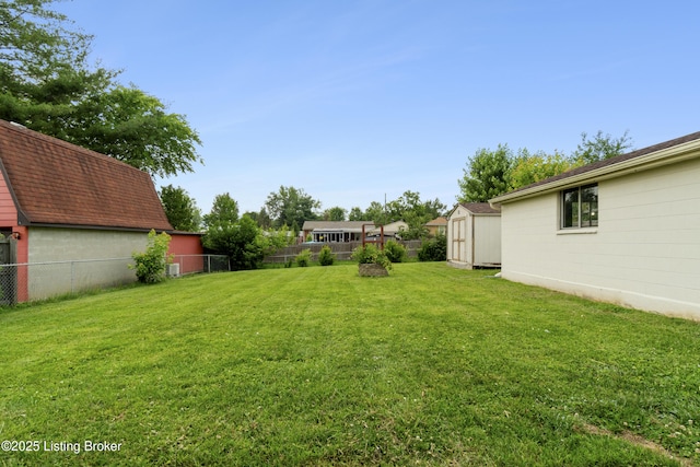 6325 Hackberry Way, Louisville, KY 40229 - fenced backyard featuring a storage unit