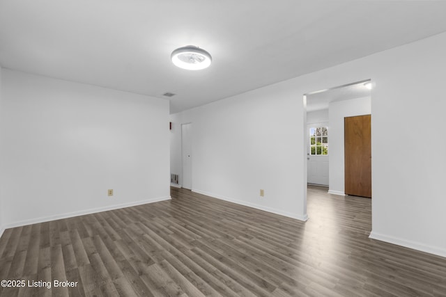 6325 Hackberry Way, Louisville, KY 40229 - spare room featuring dark wood-style floors and baseboards