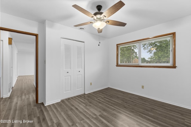 6325 Hackberry Way, Louisville, KY 40229 - unfurnished bedroom featuring wood finished floors, a closet, and ceiling fan