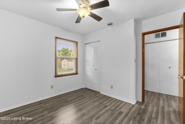 6325 Hackberry Way, Louisville, KY 40229 - unfurnished bedroom featuring dark wood-style floors, a closet, and ceiling fan