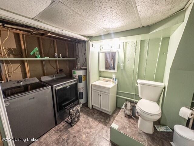 2866 Sunbeam Rd, Leitchfield, KY 42754 - laundry area featuring water heater and washer and clothes dryer