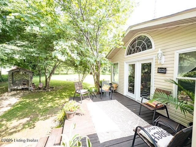 2866 Sunbeam Rd, Leitchfield, KY 42754 - wooden deck featuring a yard