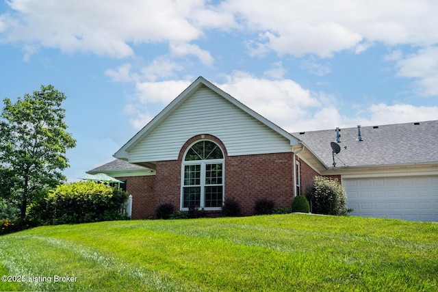 1003 Persimmon Pl, La Grange, KY 40031 - view of side of home with a lawn, brick siding, an attached garage, and a shingled roof