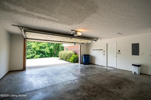 1003 Persimmon Pl, La Grange, KY 40031 - garage featuring electric panel and a garage door opener