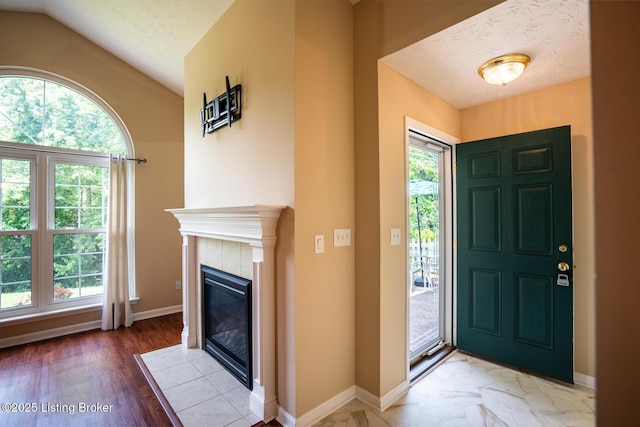 1003 Persimmon Pl, La Grange, KY 40031 - foyer featuring a fireplace and lofted ceiling