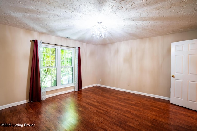 1003 Persimmon Pl, La Grange, KY 40031 - unfurnished room with a chandelier and wood finished floors