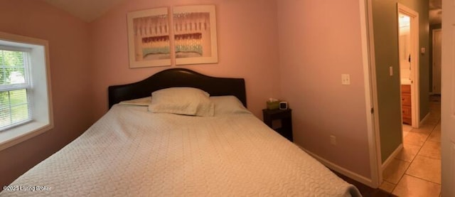 1102 W Hebron Ln, Shepherdsville, KY 40165 - bedroom featuring light tile patterned floors and baseboards
