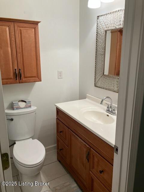 1102 W Hebron Ln, Shepherdsville, KY 40165 - half bath featuring vanity and tile patterned floors