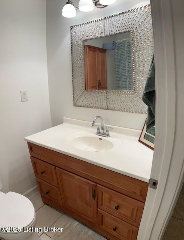 1102 W Hebron Ln, Shepherdsville, KY 40165 - bathroom featuring vanity and tile patterned flooring