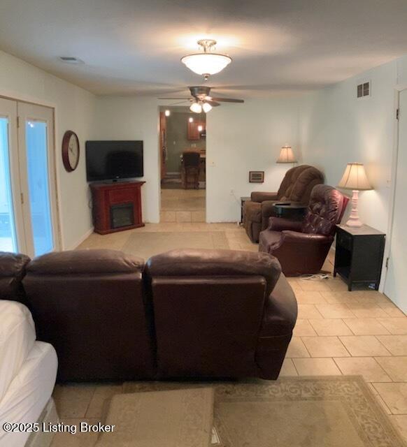 1102 W Hebron Ln, Shepherdsville, KY 40165 - living room with a ceiling fan and light tile patterned floors