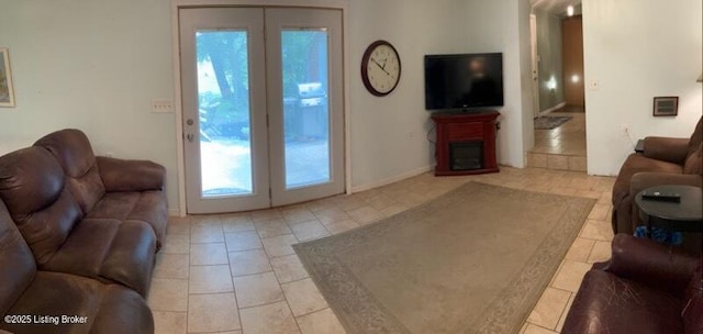 1102 W Hebron Ln, Shepherdsville, KY 40165 - living room featuring healthy amount of natural light and light tile patterned floors