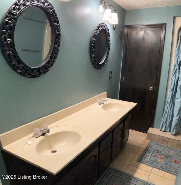 1102 W Hebron Ln, Shepherdsville, KY 40165 - full bath with double vanity and tile patterned floors