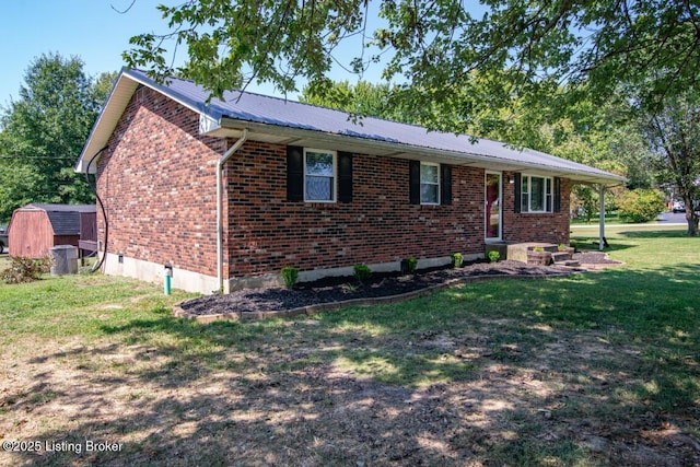 10563 S Dixie Hwy, Sonora, KY 42776 - ranch-style home featuring a front yard, brick siding, and a metal roof