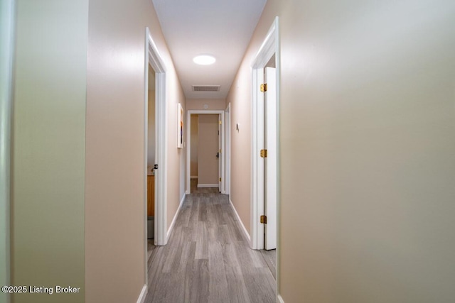 10563 S Dixie Hwy, Sonora, KY 42776 - hallway featuring baseboards and light wood-style flooring