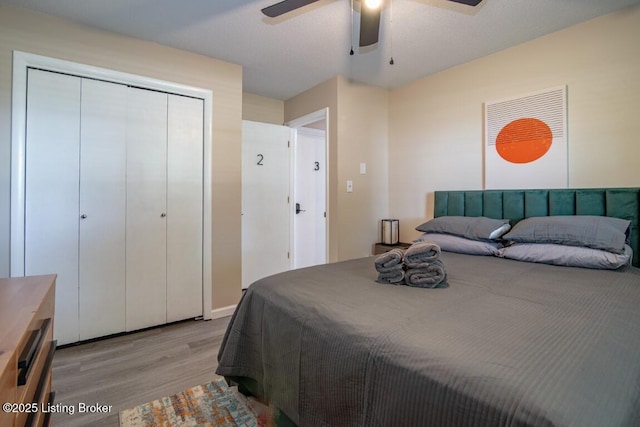10563 S Dixie Hwy, Sonora, KY 42776 - bedroom featuring light wood-style flooring, a ceiling fan, and a closet