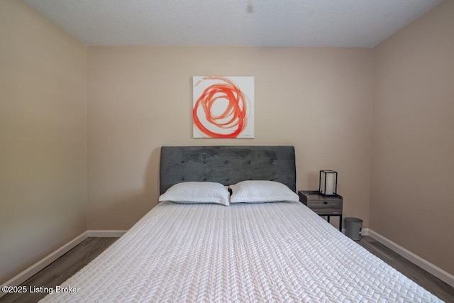 10563 S Dixie Hwy, Sonora, KY 42776 - bedroom featuring baseboards and wood finished floors