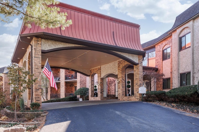 5800 Coach Gate Wynde Unit 312D, Louisville, KY 40207 - view of property featuring asphalt driveway