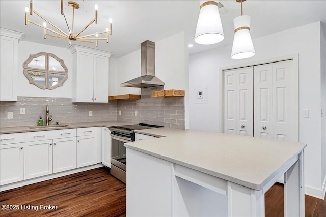 5800 Coach Gate Wynde Unit 312D, Louisville, KY 40207 - kitchen with wall chimney exhaust hood, electric range, light countertops, backsplash, and dark wood-style floors