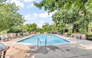 5800 Coach Gate Wynde Unit 312D, Louisville, KY 40207 - community pool with a patio