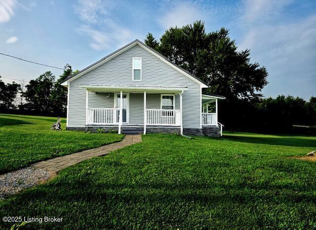 1515 Concord Rd, Falls Of Rough, KY 40119 - bungalow featuring a front yard and a porch