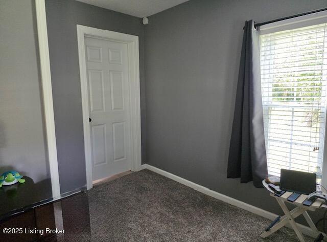 1515 Concord Rd, Falls Of Rough, KY 40119 - unfurnished office with carpet floors and baseboards