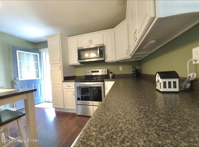 1515 Concord Rd, Falls Of Rough, KY 40119 - kitchen with appliances with stainless steel finishes and white cabinetry