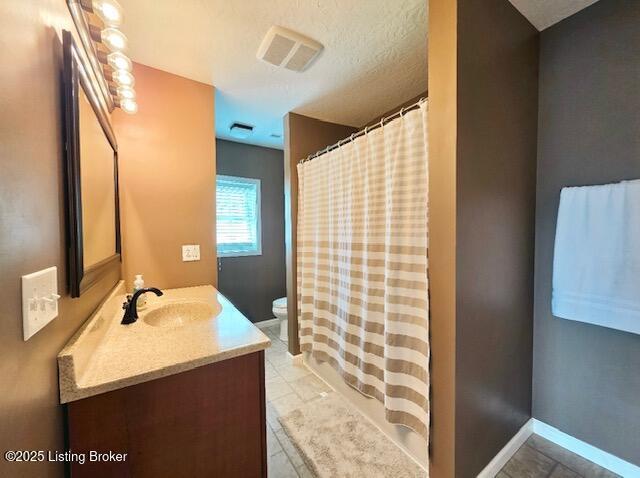 1515 Concord Rd, Falls Of Rough, KY 40119 - full bath featuring vanity, tile patterned flooring, and a shower with shower curtain