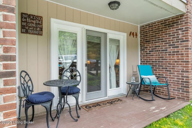 6711 Gunston Ln Unit H10, Prospect, KY 40059 - property entrance with a wooden deck and brick siding
