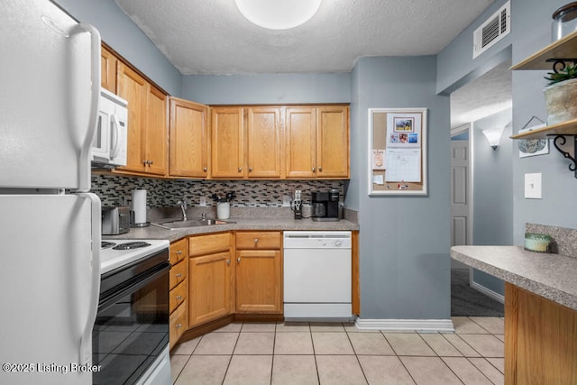 6711 Gunston Ln Unit H10, Prospect, KY 40059 - kitchen featuring white appliances, tasteful backsplash, a textured ceiling, light countertops, and light tile patterned flooring