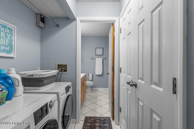 6711 Gunston Ln Unit H10, Prospect, KY 40059 - laundry room with washing machine and dryer and light tile patterned floors