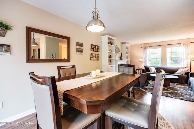 7327 Sideoats Dr, Crestwood, KY 40014 - dining room featuring dark wood-type flooring and baseboards