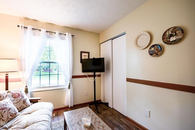 7327 Sideoats Dr, Crestwood, KY 40014 - living area featuring dark wood-type flooring and a textured ceiling