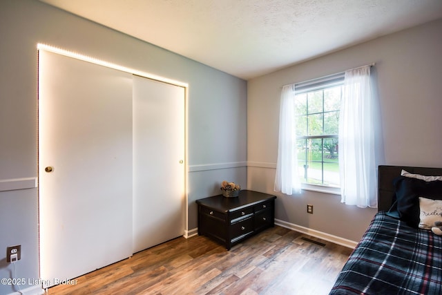 7327 Sideoats Dr, Crestwood, KY 40014 - bedroom featuring wood finished floors and a closet