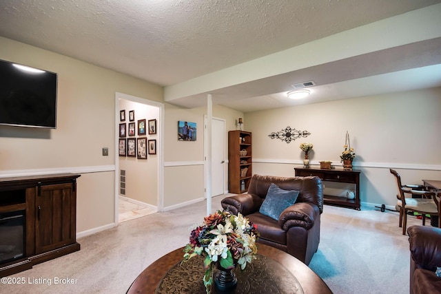 7327 Sideoats Dr, Crestwood, KY 40014 - living room with light colored carpet and a textured ceiling