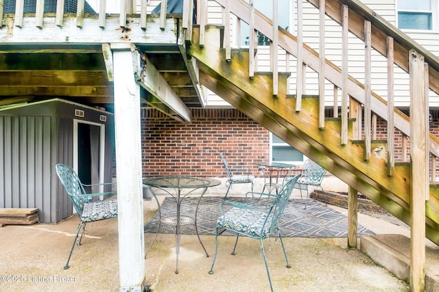 7327 Sideoats Dr, Crestwood, KY 40014 - view of patio with stairs and outdoor dining area