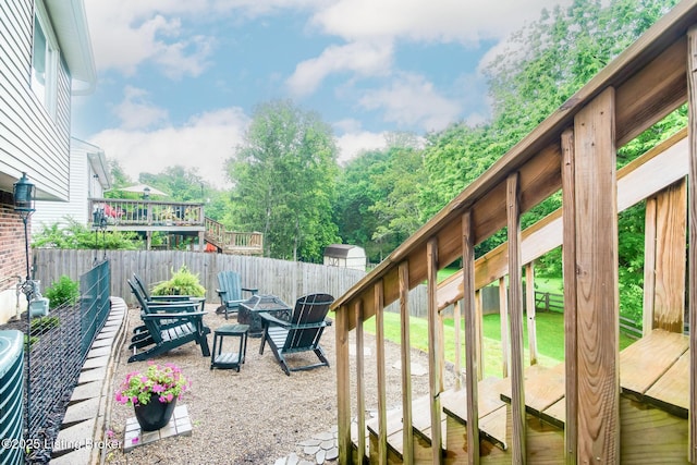 7327 Sideoats Dr, Crestwood, KY 40014 - fenced backyard with an outdoor fire pit