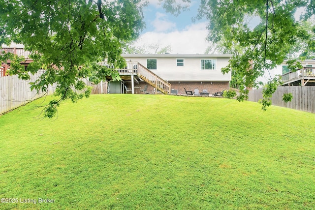 7327 Sideoats Dr, Crestwood, KY 40014 - fenced backyard featuring stairway and a deck