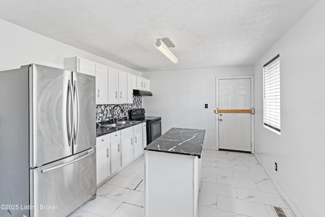 2215 W Jefferson St, Louisville, KY 40212 - kitchen featuring freestanding refrigerator, electric range, light marble finish floors, under cabinet range hood, and white cabinets
