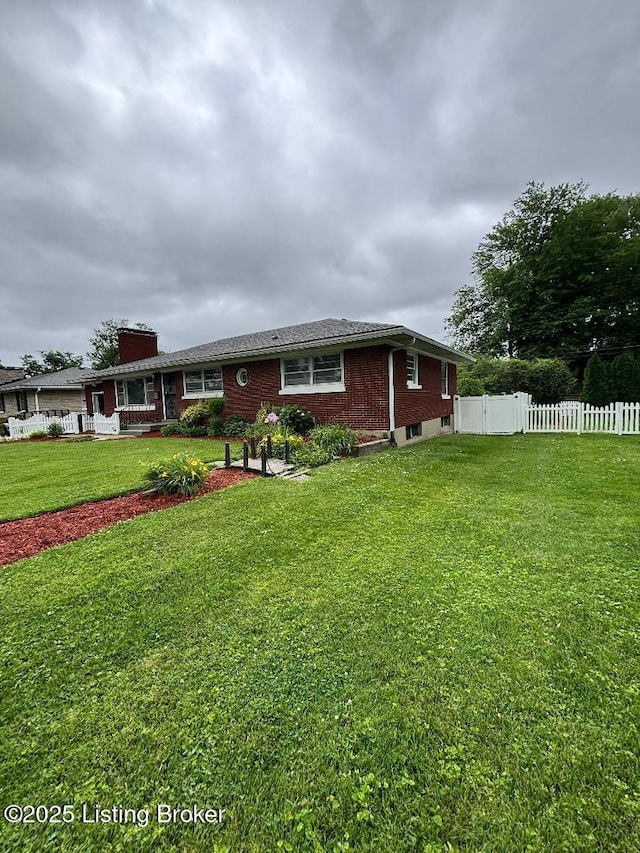 2707 Sharon Way, Louisville, KY 40220 - single story home with brick siding and a chimney