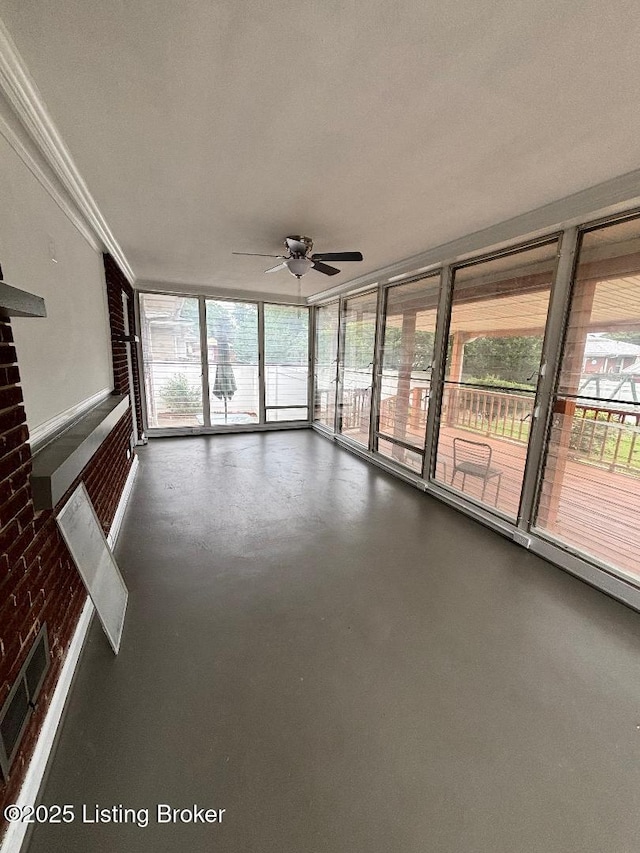 2707 Sharon Way, Louisville, KY 40220 - unfurnished sunroom with a ceiling fan, crown molding, and concrete flooring