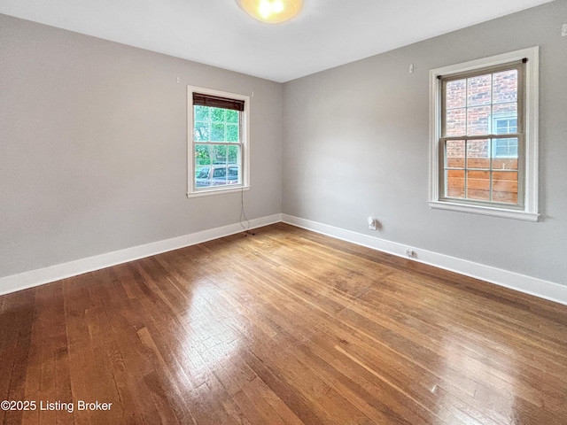 2406 Bradley Ave, Louisville, KY 40217 - unfurnished room featuring hardwood / wood-style flooring