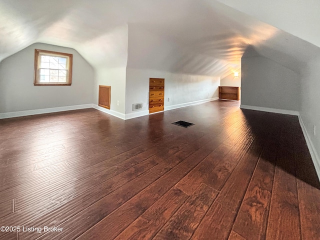 2406 Bradley Ave, Louisville, KY 40217 - bonus room with dark wood-type flooring and lofted ceiling