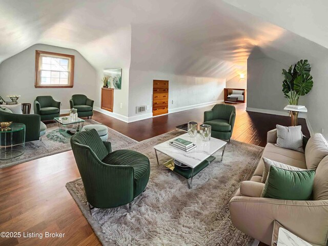 2406 Bradley Ave, Louisville, KY 40217 - living area with vaulted ceiling and wood finished floors