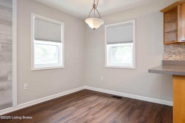 7210 River Rd, Prospect, KY 40059 - unfurnished dining area featuring plenty of natural light and dark wood-style flooring