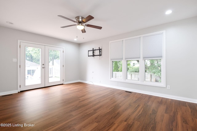 7210 River Rd, Prospect, KY 40059 - empty room featuring plenty of natural light, french doors, a ceiling fan, wood finished floors, and recessed lighting
