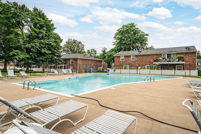 1251 Westlynne Way Apt 2, Louisville, KY 40222 - community pool featuring a patio area