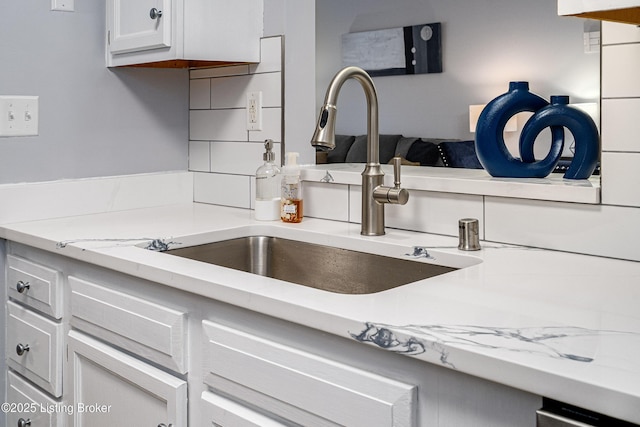 1251 Westlynne Way Apt 2, Louisville, KY 40222 - kitchen featuring white cabinetry and light stone countertops
