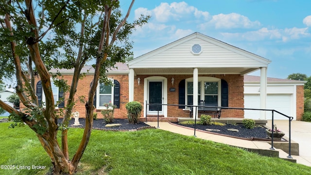 2204 Renown Dr, Jeffersontown, KY 40299 - ranch-style home featuring brick siding, an attached garage, concrete driveway, covered porch, and a front lawn