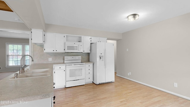 2204 Renown Dr, Jeffersontown, KY 40299 - kitchen with white appliances, light countertops, light wood-style floors, and white cabinets