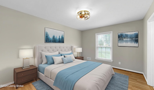2204 Renown Dr, Jeffersontown, KY 40299 - bedroom featuring baseboards and light wood-type flooring